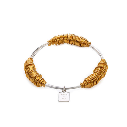 Gold wire wrapped Juno bangle by Black & Sigi